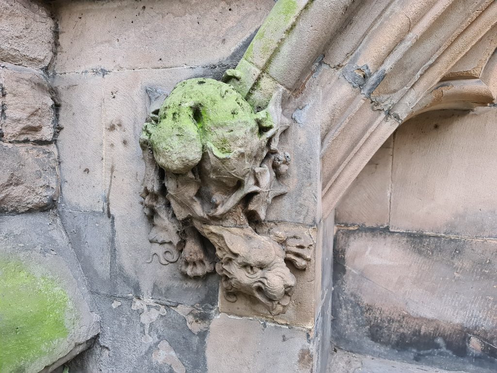 The carved stone grotesque on St Martin in the Bull Ring